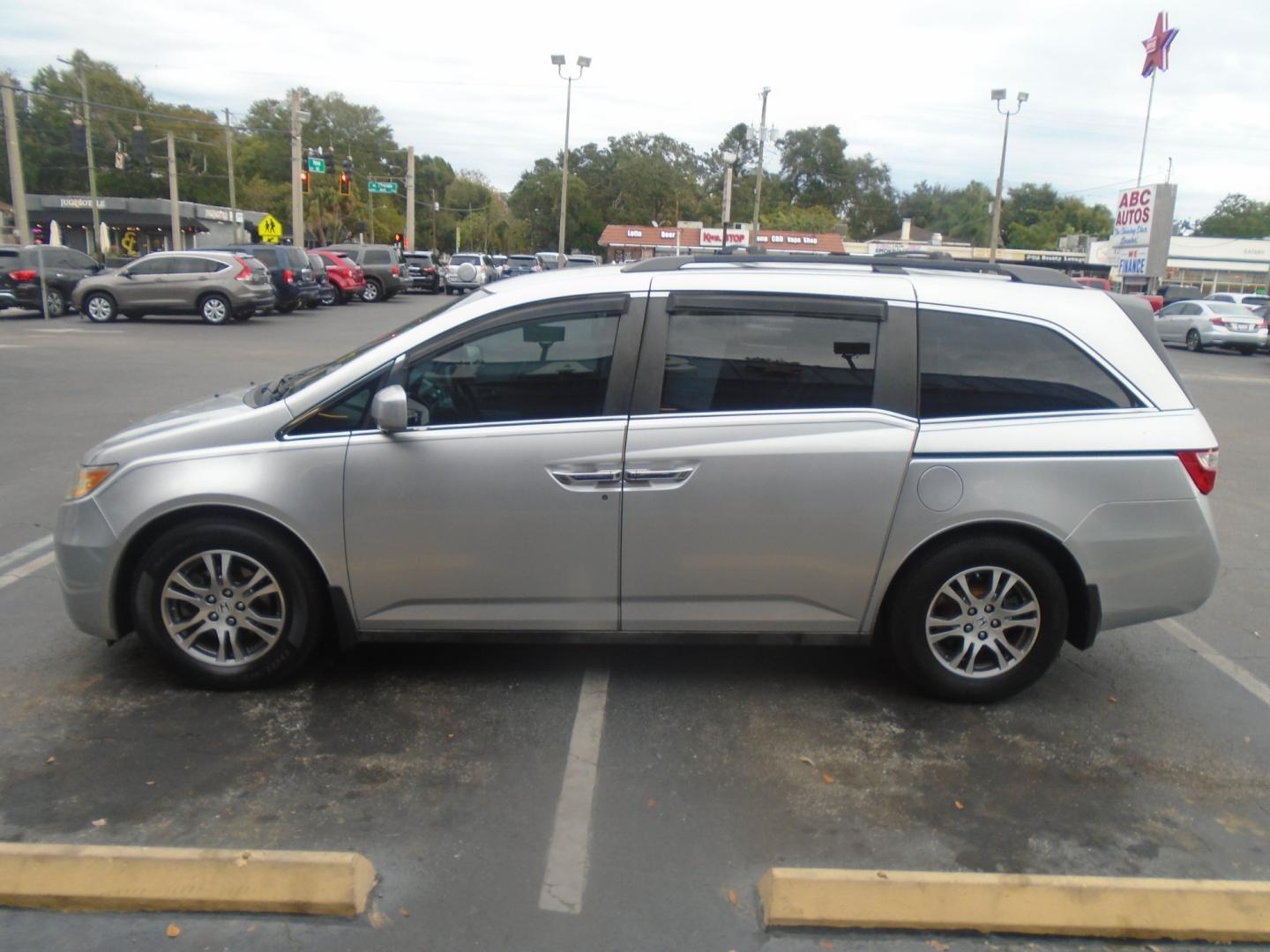 2011 Honda Odyssey EX (5FNRL5H46BB) with an 3.5L V6 SOHC 24V engine, 5-Speed Automatic transmission, located at 6112 N Florida Avenue, Tampa, FL, 33604, (888) 521-5131, 27.954929, -82.459534 - Photo#0